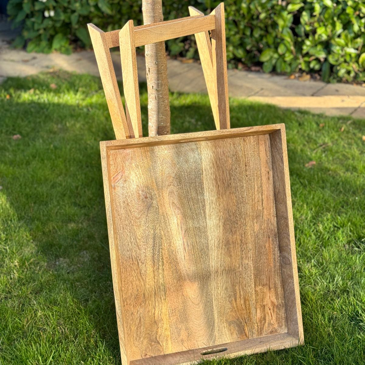Sloping edge butler tray on foldable stand - Mango wood. Stand and tray separated.