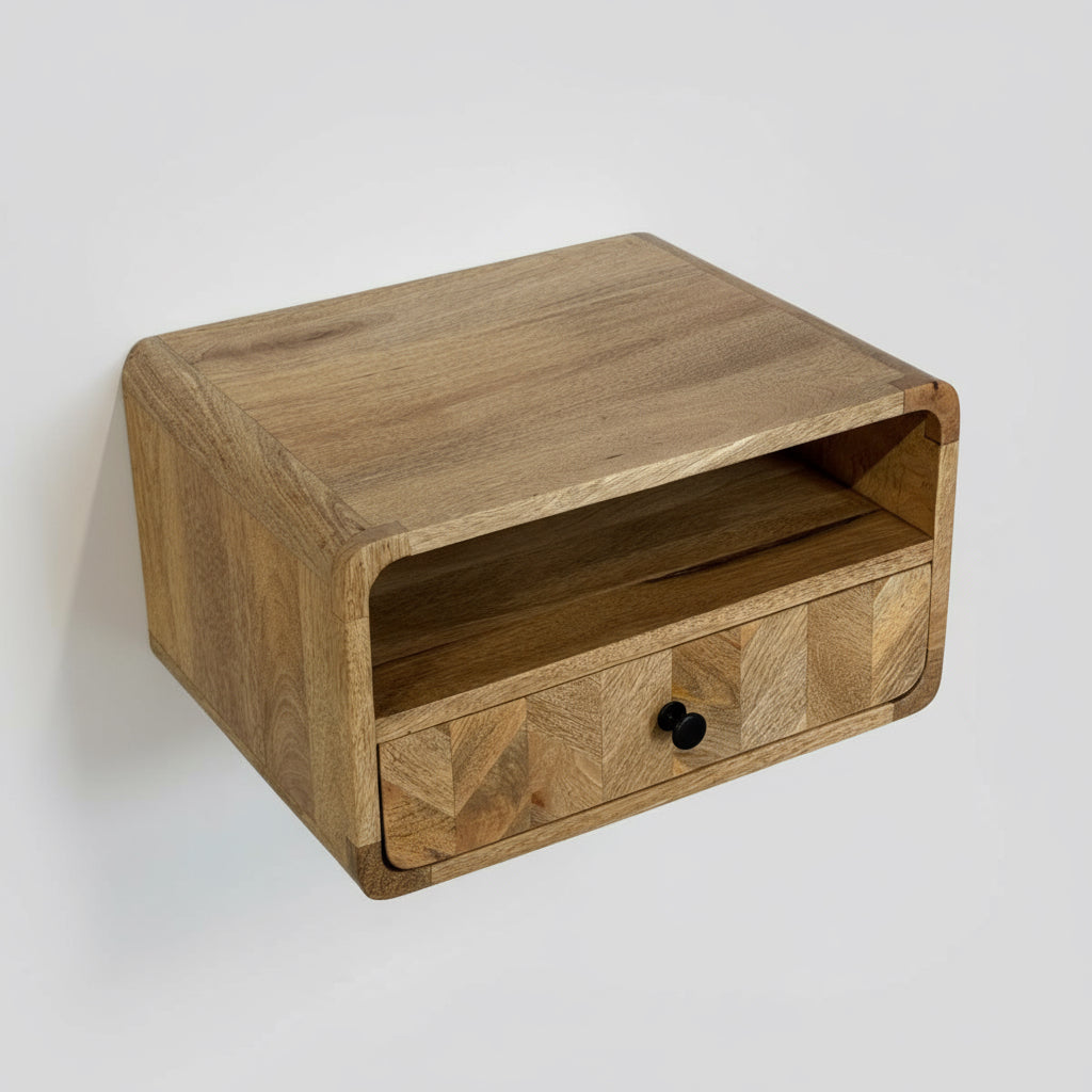 Wooden wall-mounted cabinet with a drawer on a white wall.