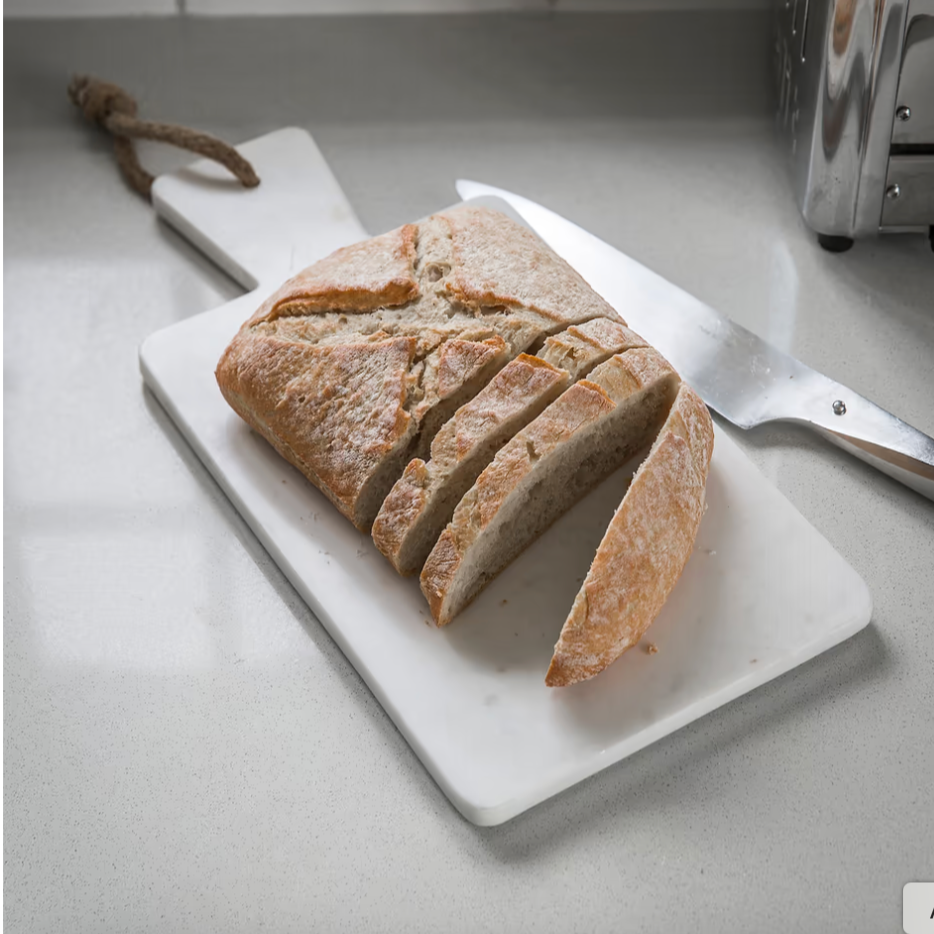 Marble chopping board - round or rectangular design. Rectangular design with bread.