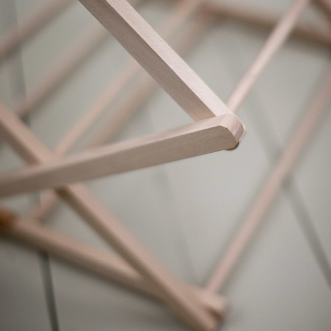 Natural Beech wood folding clothes horse. Close up. 