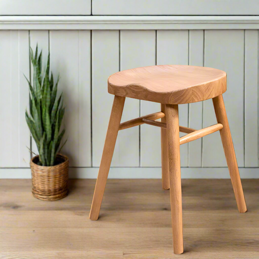 Small dining stool with heavy carved comfortable seat in ASH wood.