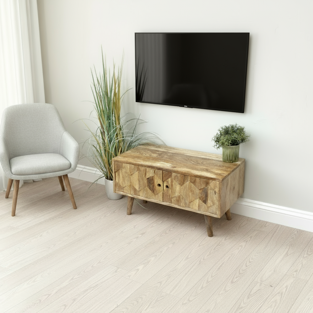 Wooden sideboard with decorative items in a room with a chair and plants.