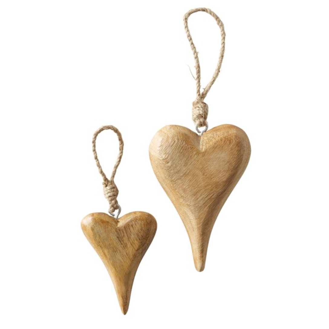 Two wooden heart-shaped hanging decorations with string on a white background