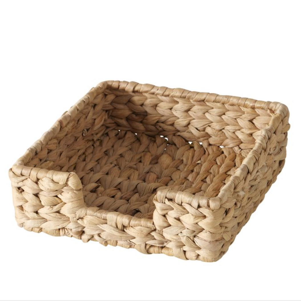 Woven rectangular basket on a white background
