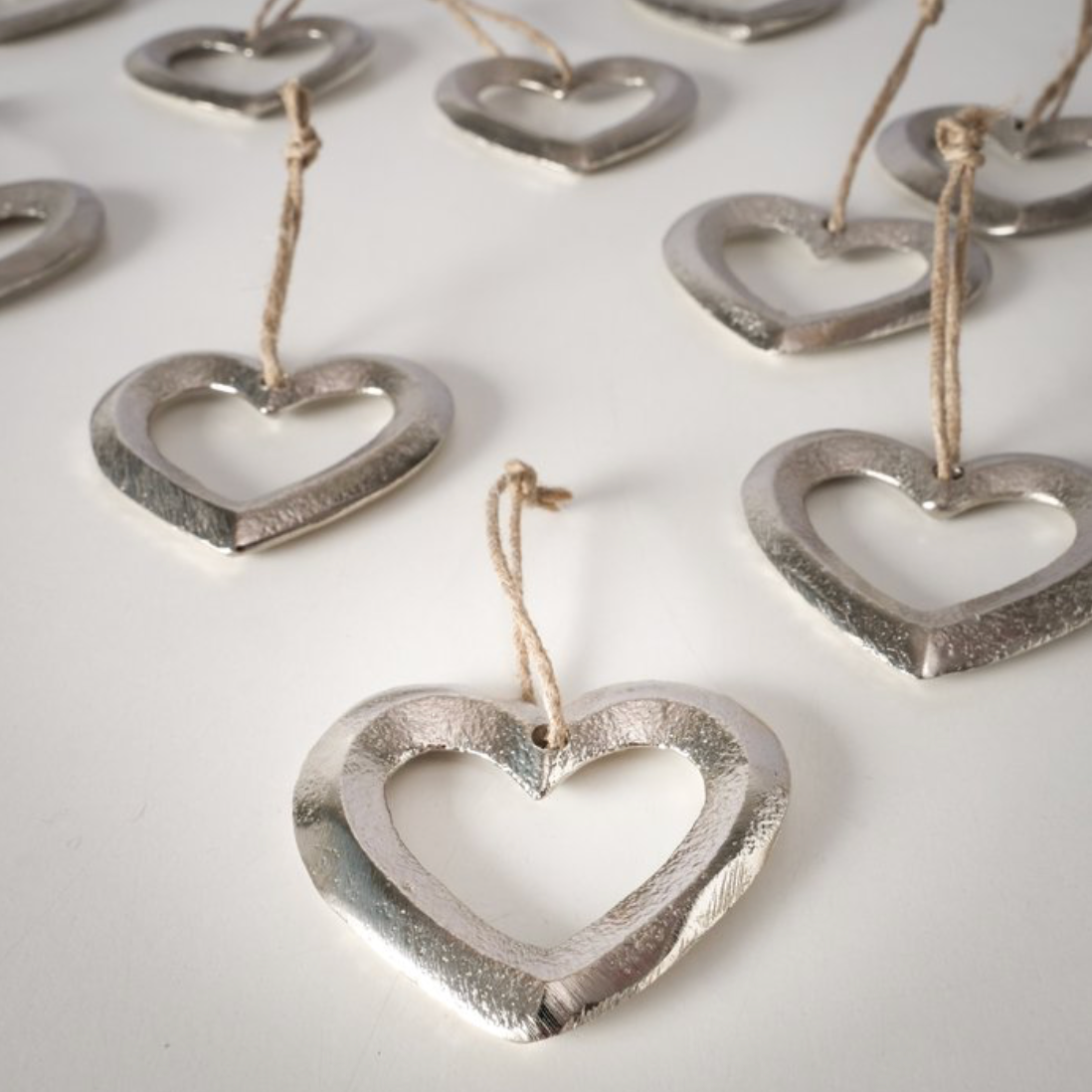 Aluminium hanging decorations - star or heart design
