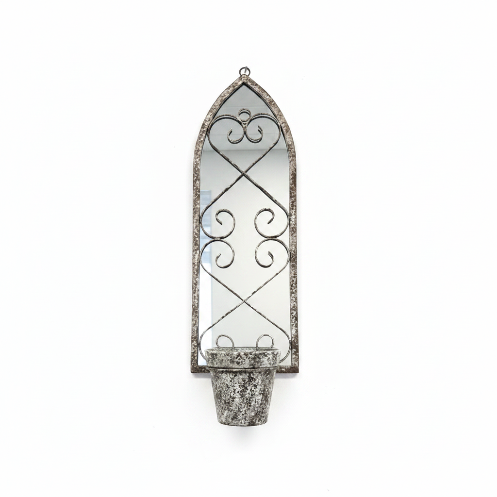 Decorative wall-mounted metal planter with a mirror on a white wall