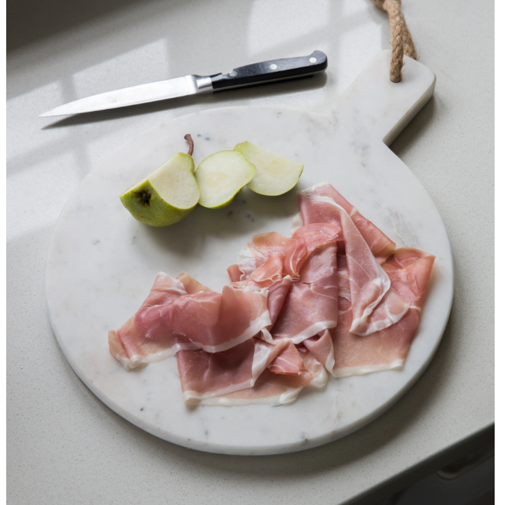 Marble chopping board - round or rectangular design. Round design with cured meats.