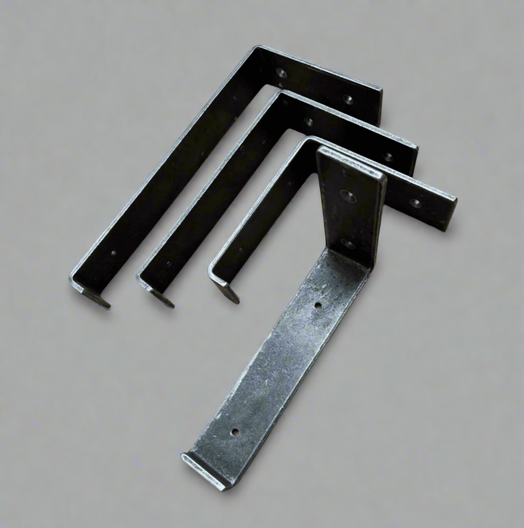 Pair of cast iron lipped brackets. Available in 4 sizes. All sizes shown