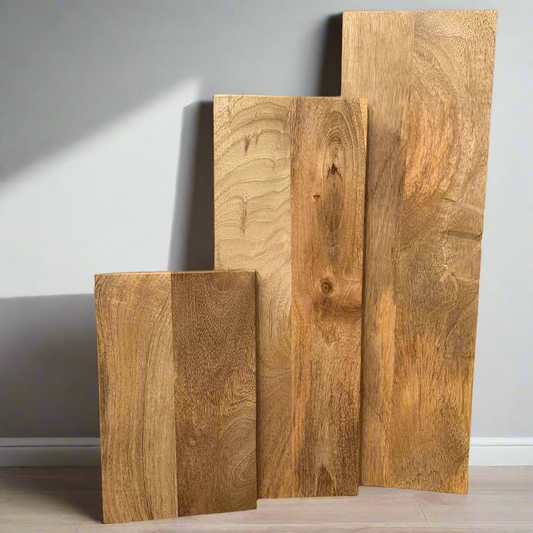 Cut to size planks of Mango wood stood up in various sizes