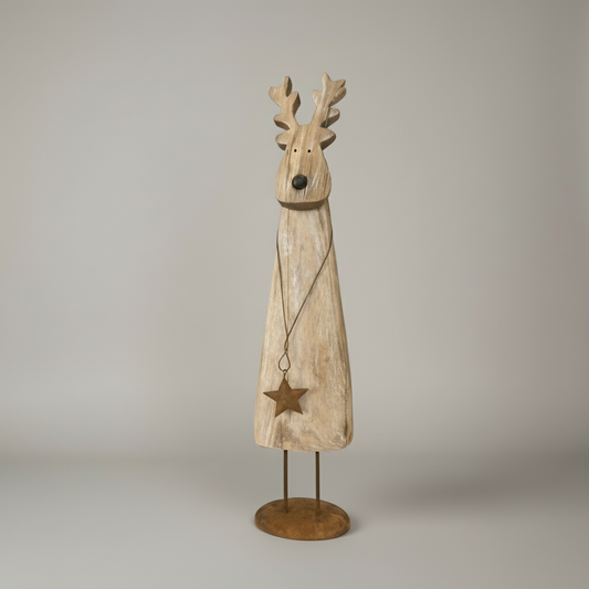 Floor standing reindeer decoration - wood with metal detail. Surrounded by smaller decorations.