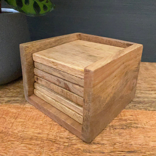 Set of 6 solid Mango wood square coasters with holder.