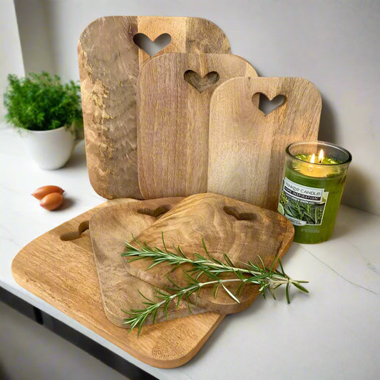 Mango wood chopping boards with cut out heart group shot