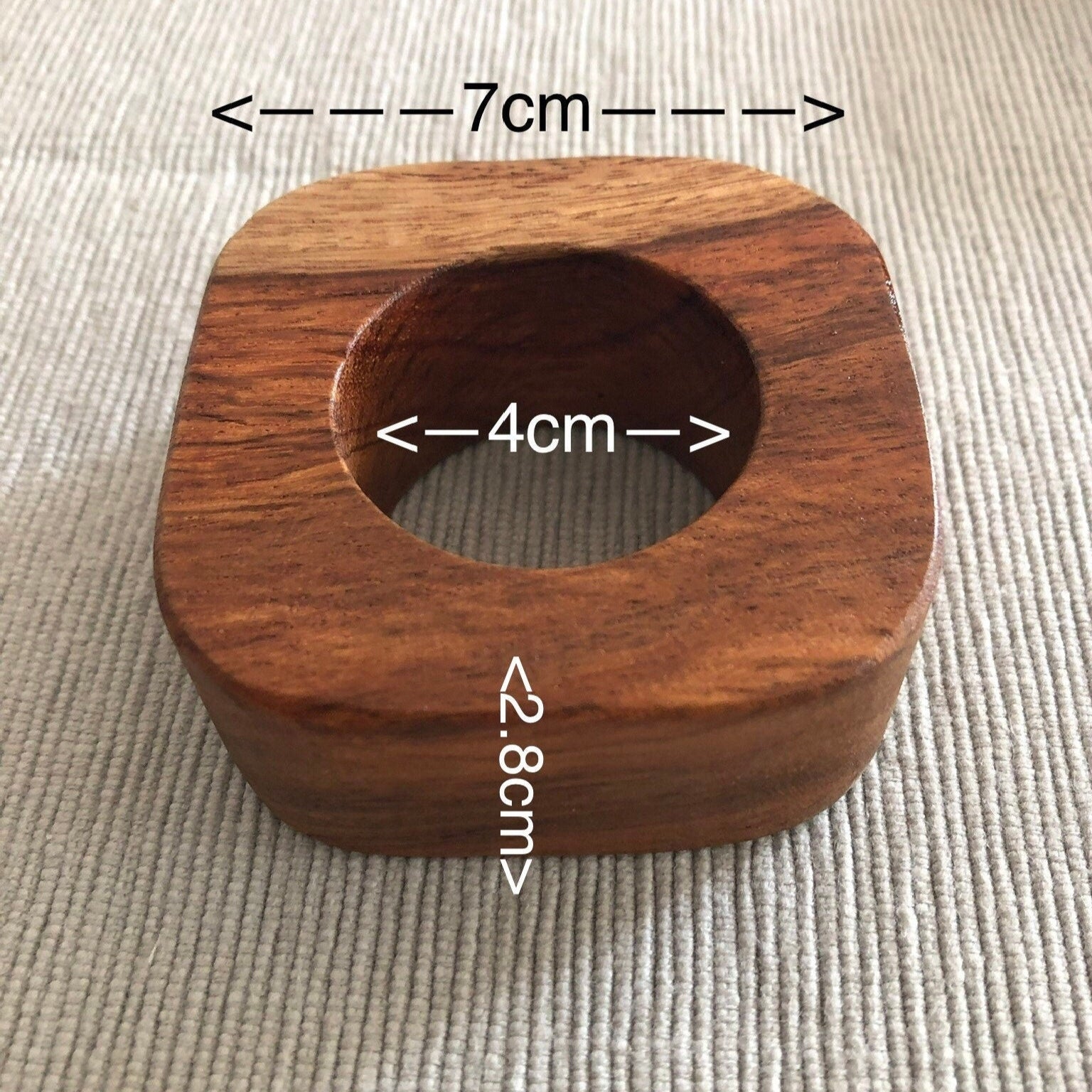 Set of solid Sheesham wood napkin rings with size dimensions. 