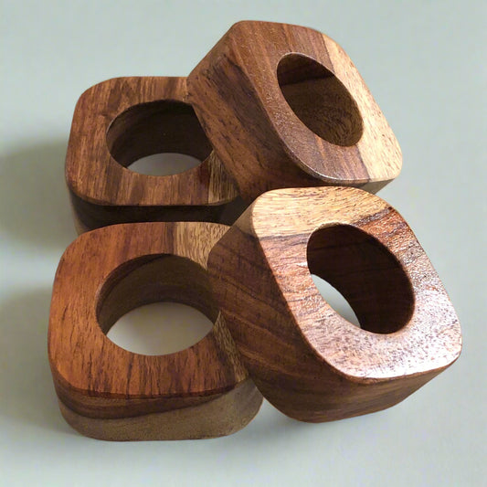 Set of solid Sheesham wood napkin rings.