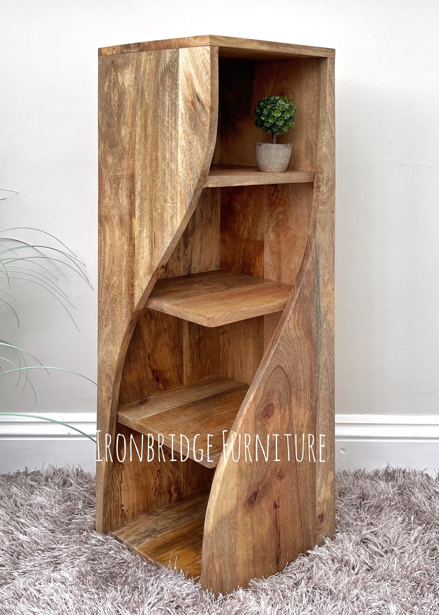 Medium twisted bookcase from an angle. 
