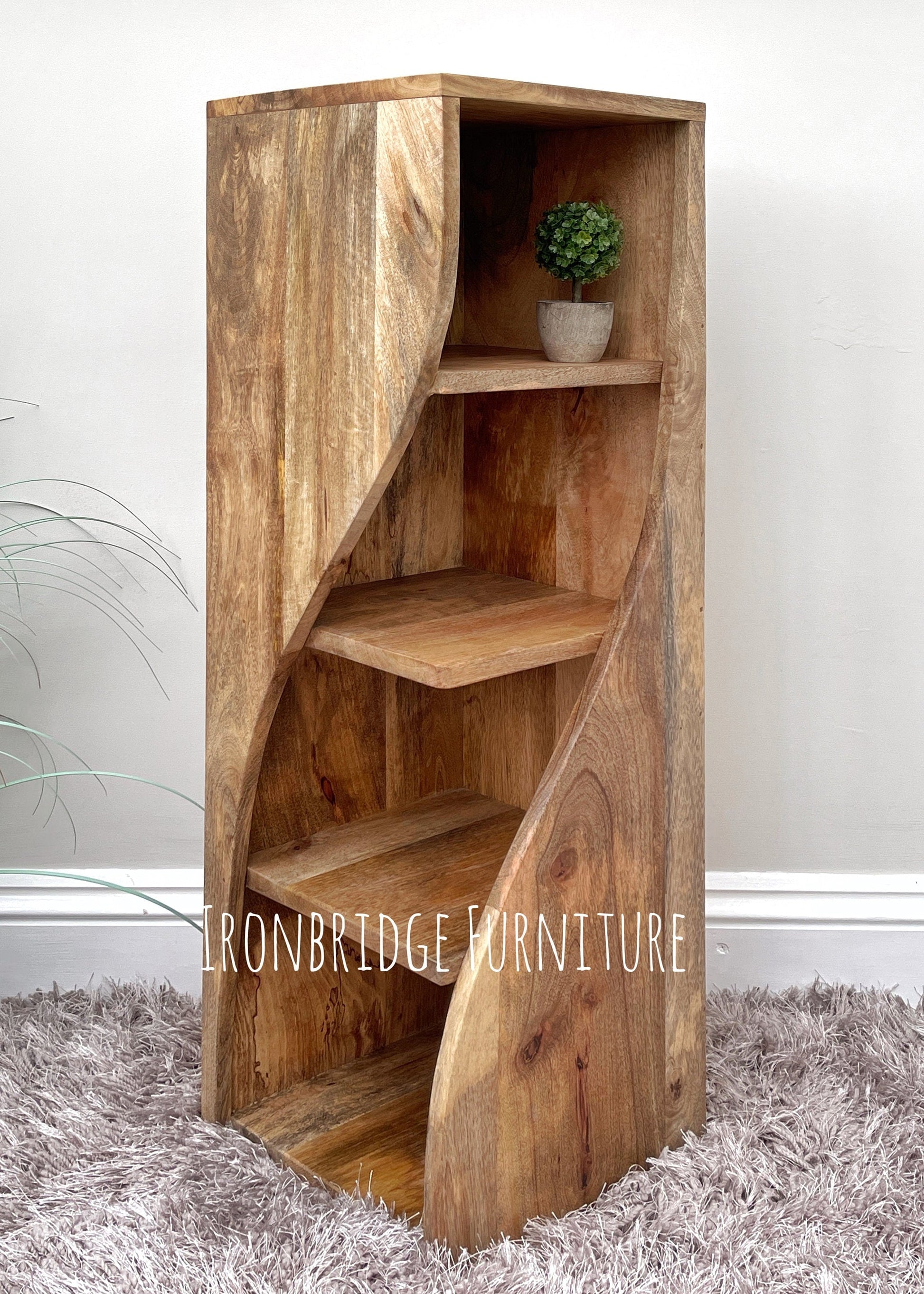 Medium twisted bookcase from an angle. 