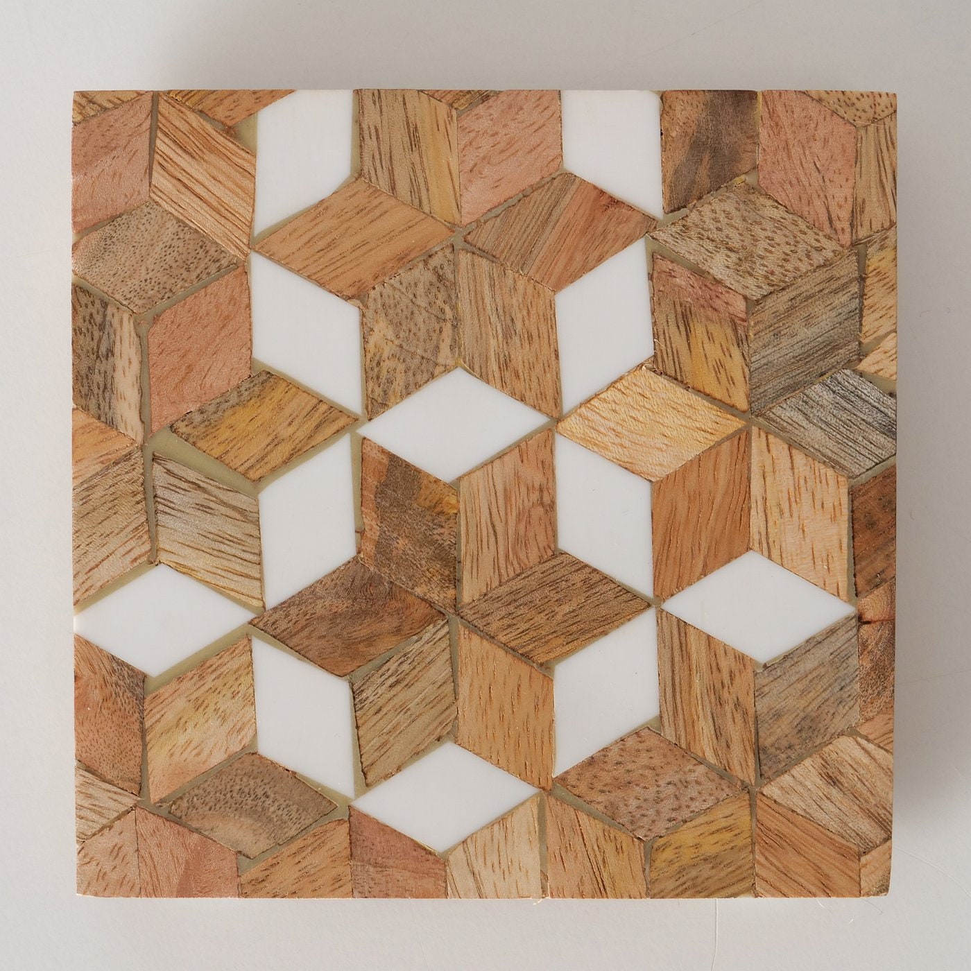 Mosaic Mango wood square coasters with resin inlay. Close up.