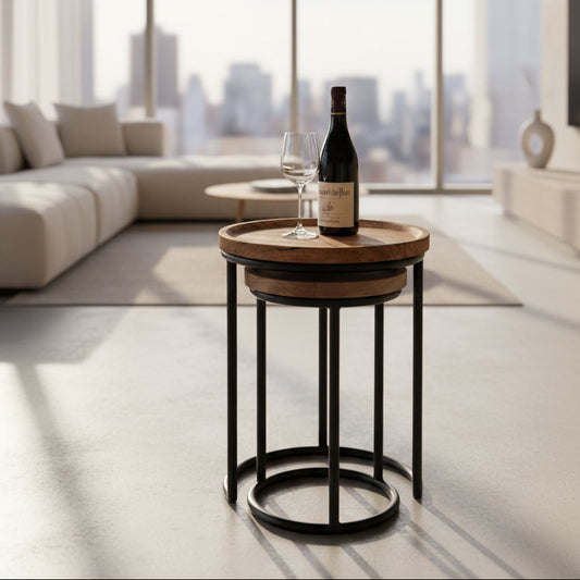 Nest of 2 Industrial style slim round side tables. Bottle and wine placed on top.