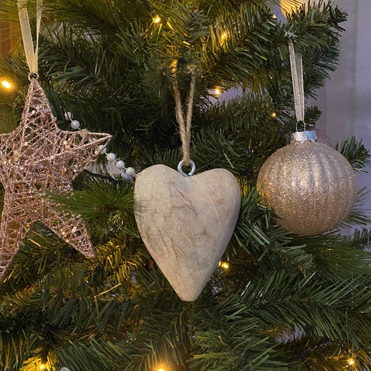 Hanging Mango wood carved heart on a chunky jute string
