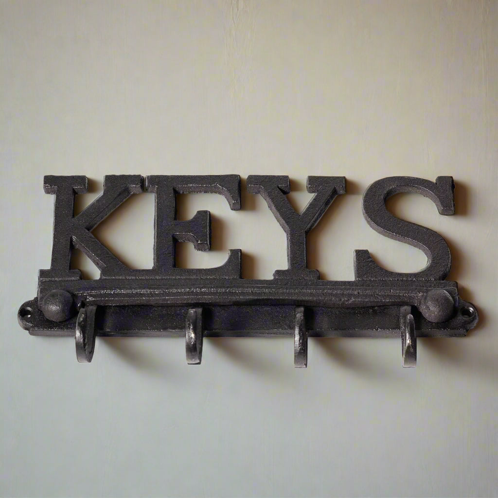 Black painted cast iron KEYS set of hooks. Mounted.