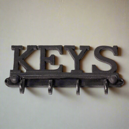 Black painted cast iron KEYS set of hooks. Mounted.