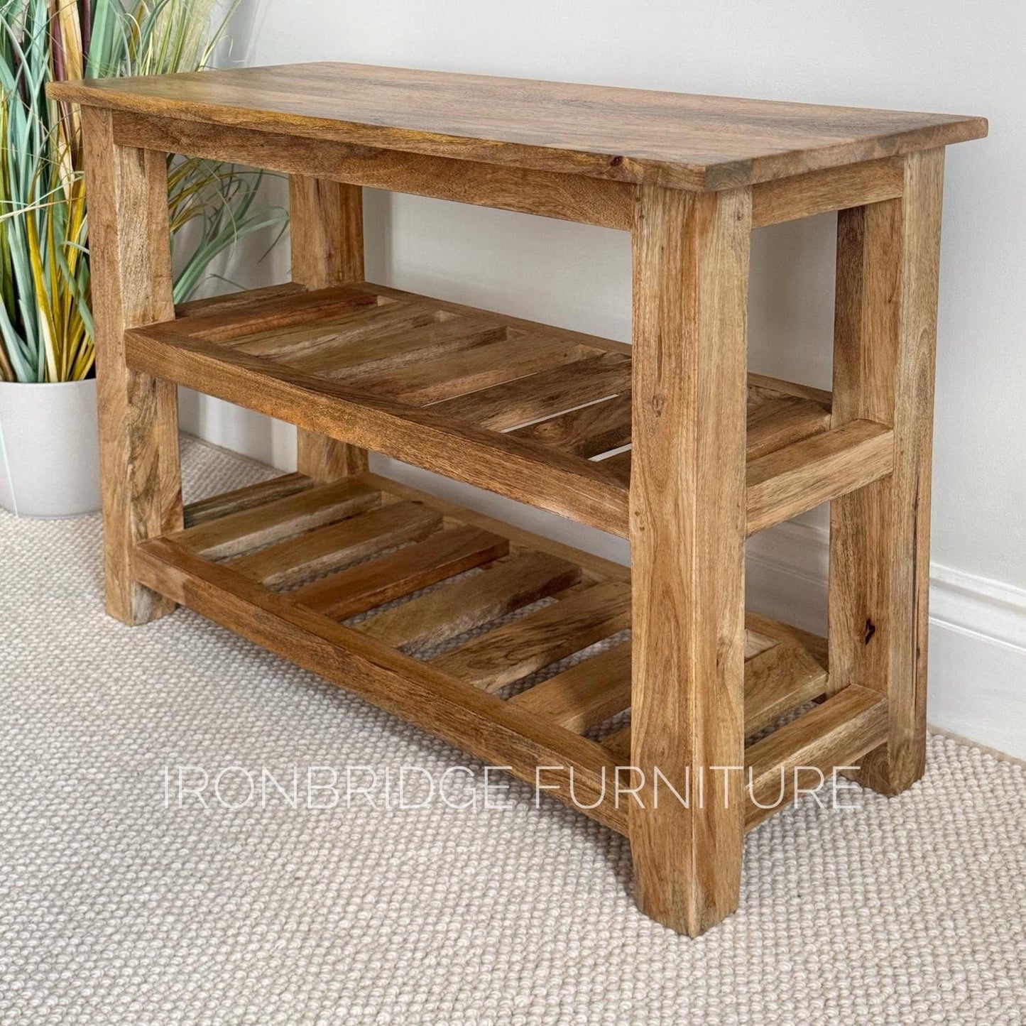 Mango wood shoe storage bench.