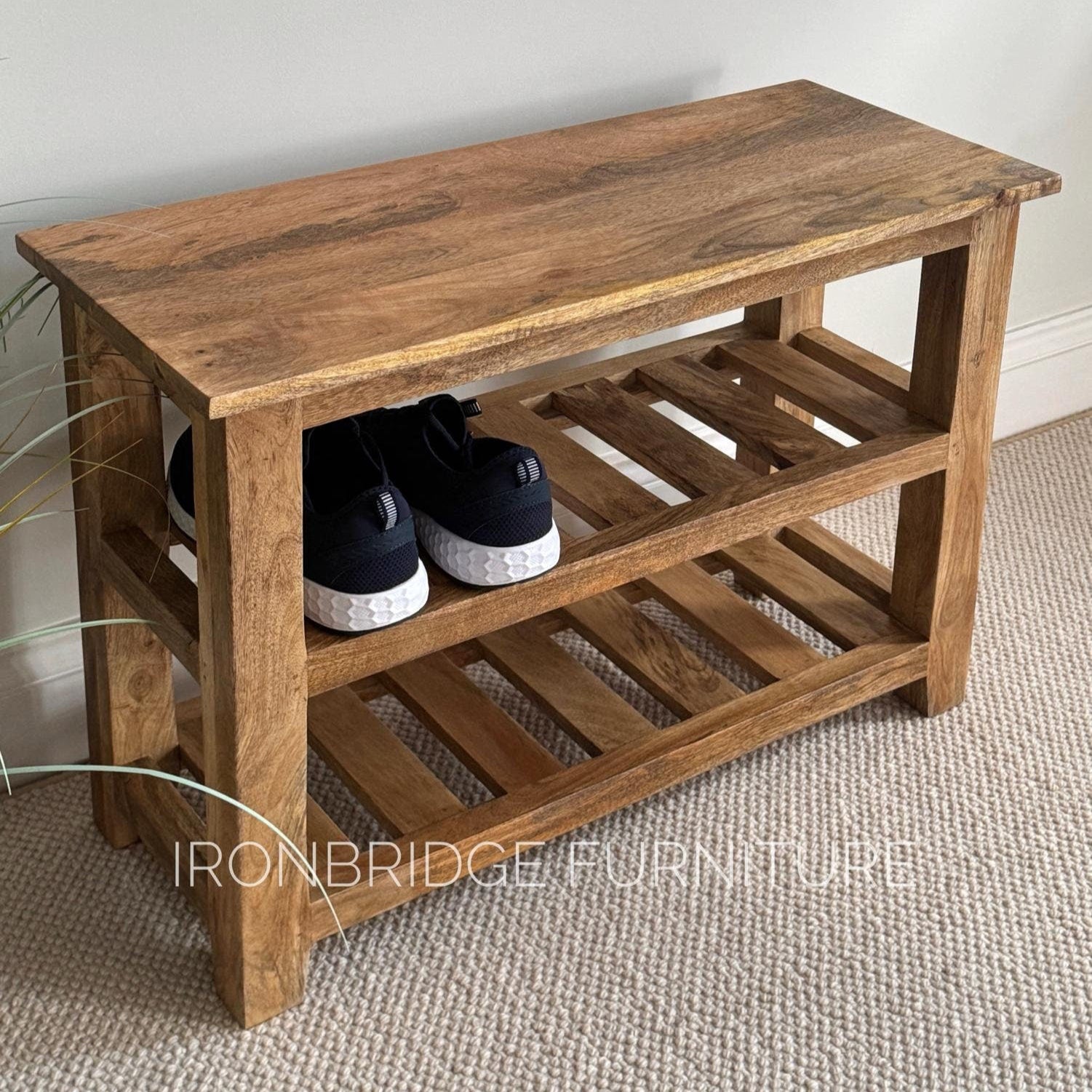 Mango wood shoe storage bench. With shoes.