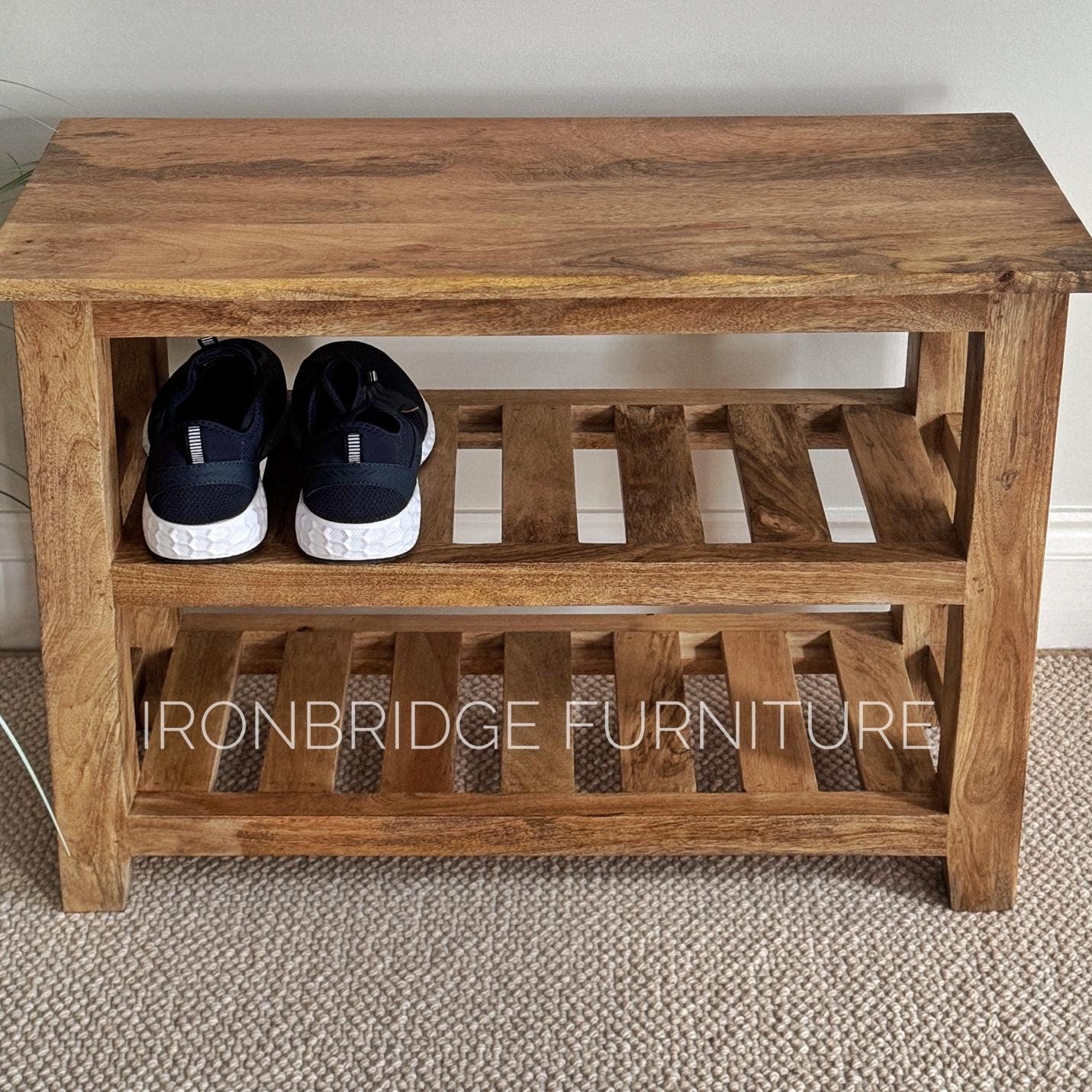 Mango wood shoe storage bench. Shot from the front. 