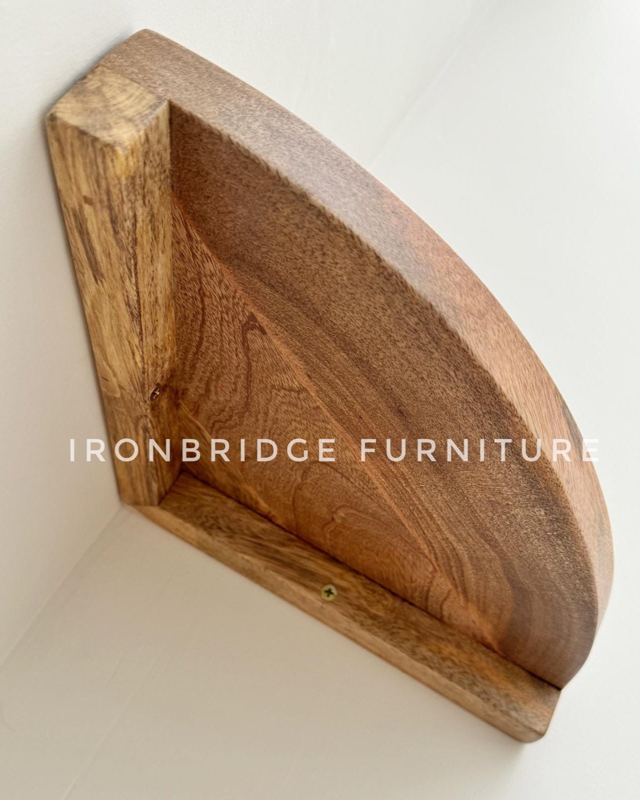 Set of 3 Mango wood rounded corner wall shelves. Shelf from underneath.