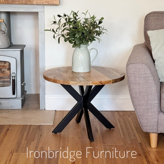 60cm round Mango wood top coffee table with black metal legs.