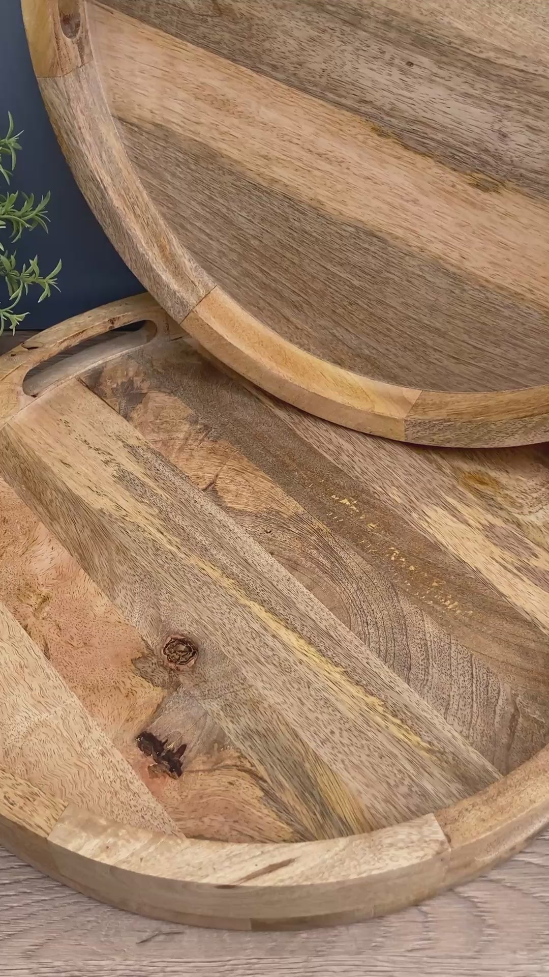 A close up of a Solid Mango wooden round tray