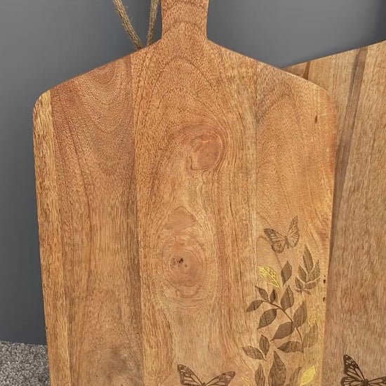 Video of Floral design etched Mango wood food serving paddle board