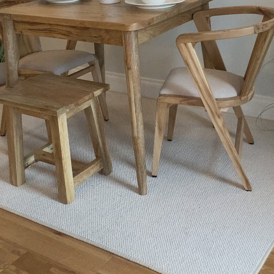 80cm Square Mango dining table with cone shaped legs dressed with 4 settings