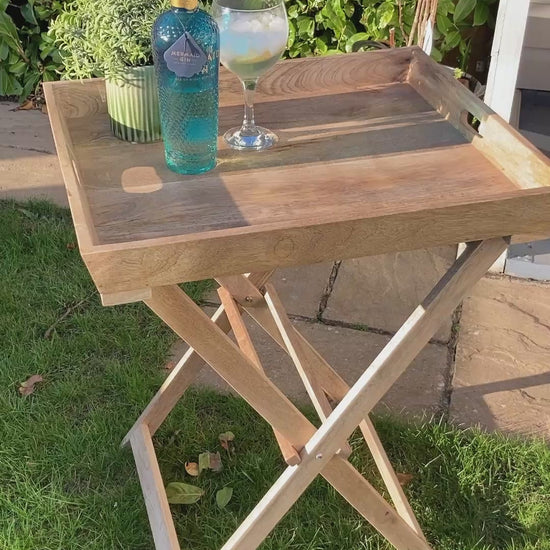 Sloping edge butler tray on foldable stand - Mango wood. Video